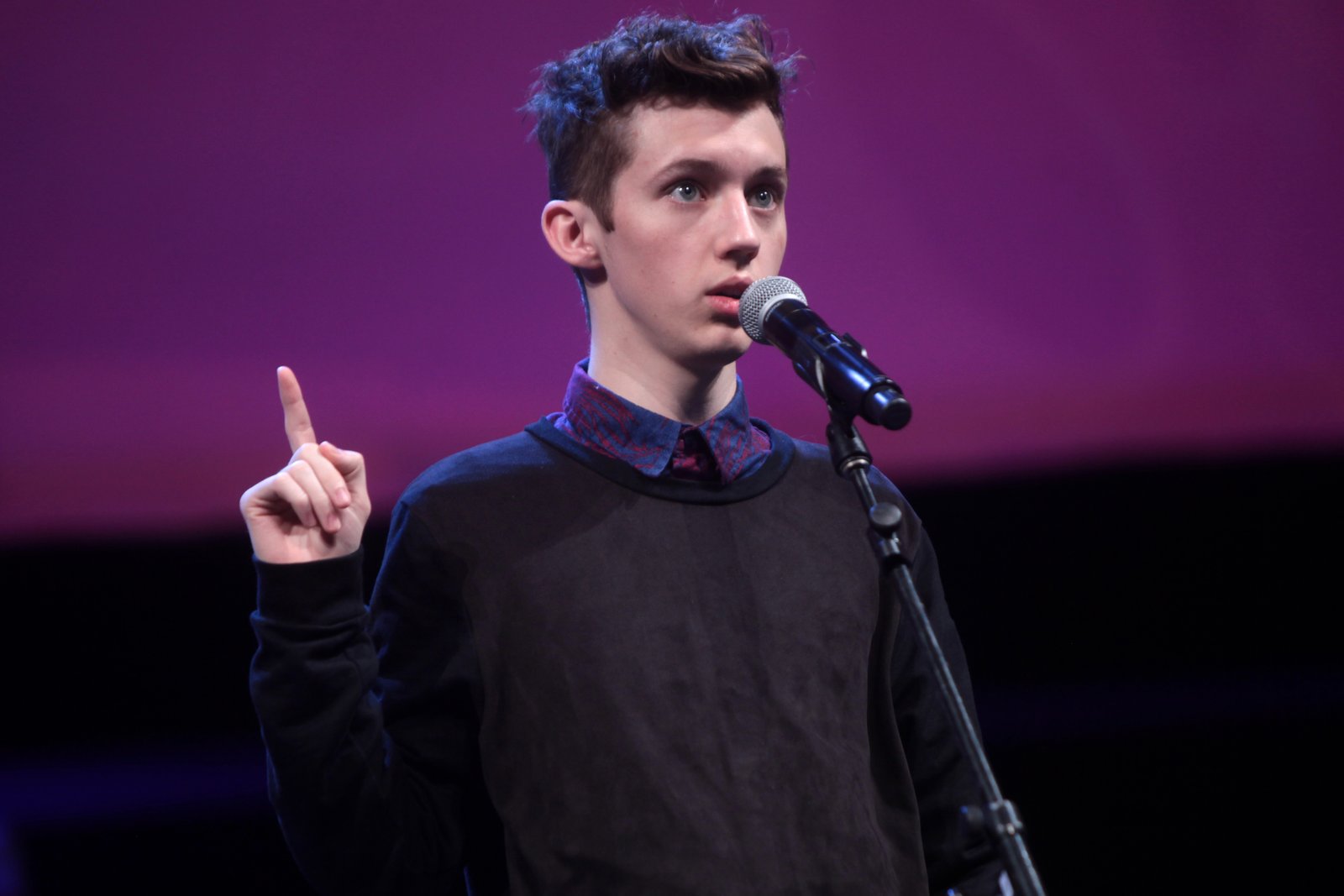 Troye Sivan speaking at an event