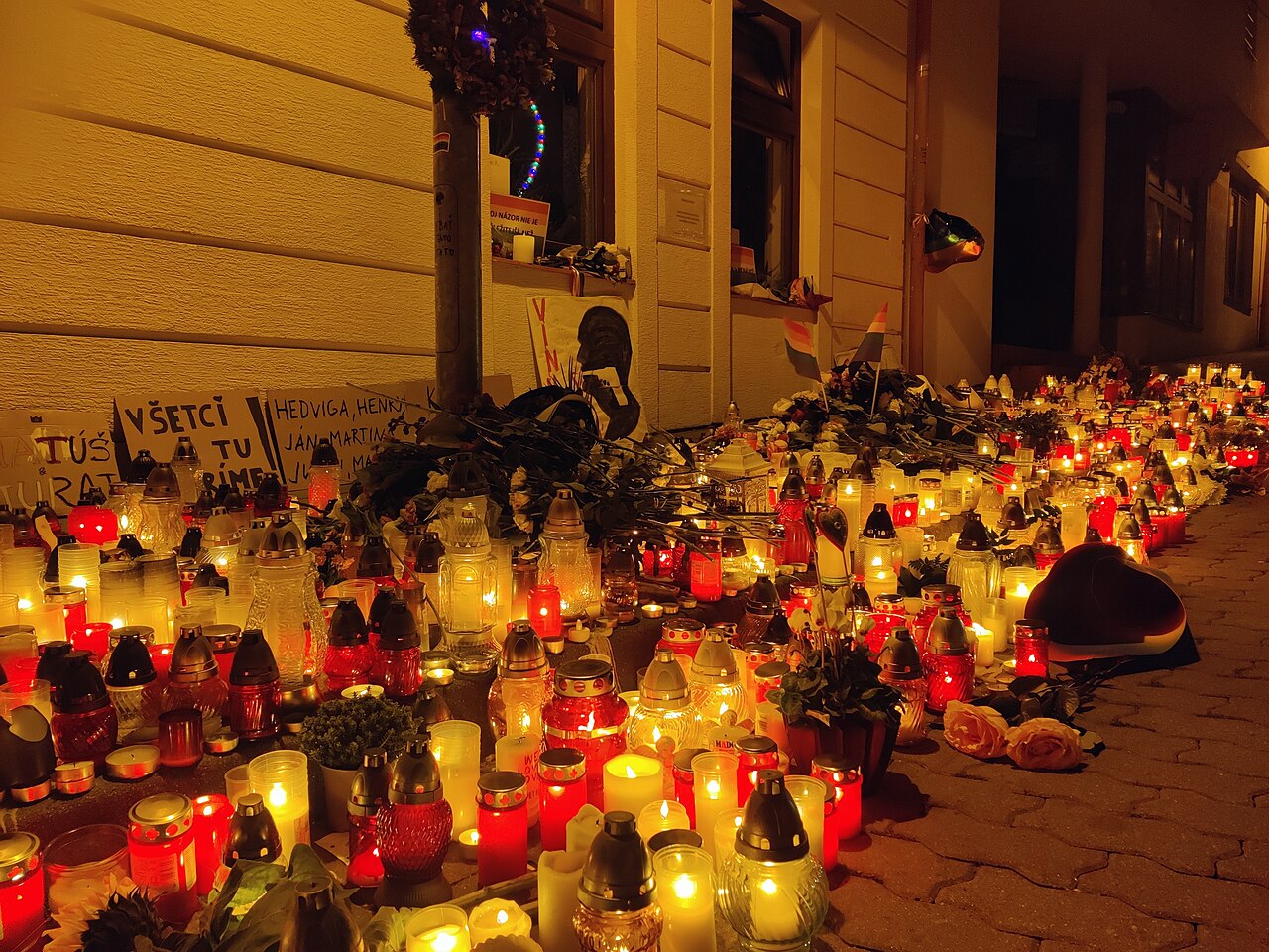 Candles and flowers laid in front of Tepláreň in Bratislava